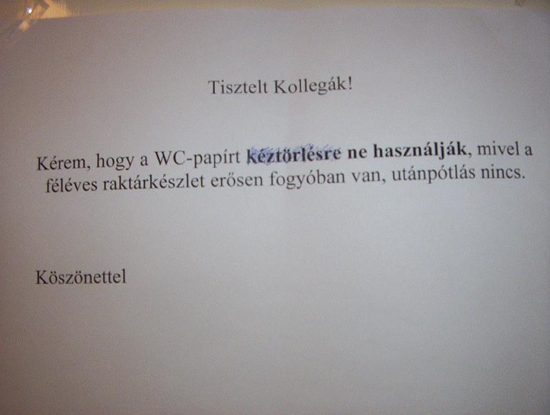 100_2810.jpg - A infamous warning posted on door of the men's restroom at the National Archives of Hungary. The note reads: "Please do not use the toilet paper for wiping your hands, as our six-month supply is rapidly dwindling and there are no replacements."