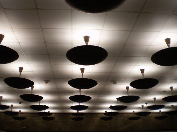 07_metro_retro.jpg - The Deák Ferenc tér metro station--there's something about these lights that I have always really liked, although the less than savory ticket inspectors standing below do take away from the overall ambiance of the place.