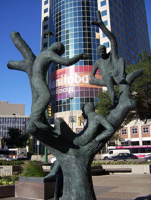 100_2576.jpg - A contemporary monument commemorating Manitoba's youth, situated near the corner of Portage and Main. The province's slogan is "Spirited Energy-Vibrant d'Energie."